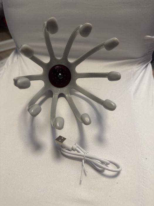 Elektryczny masażer do głowy