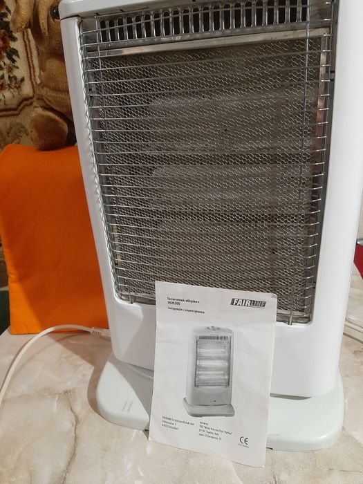 Электрообогреватель галогеновый б/у .