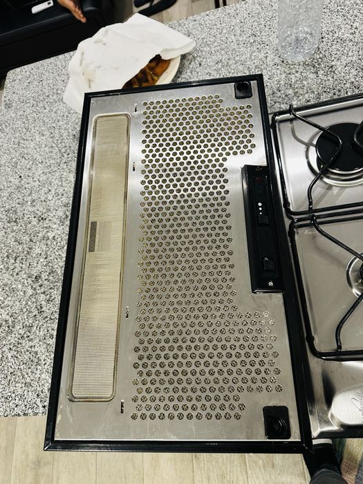 Placa de fogão há gás e exaustor