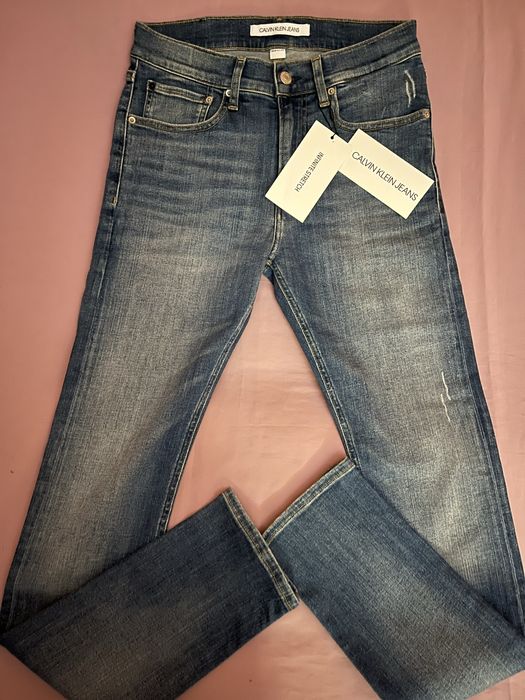 Wyprzedaż spodnie męskie Calvin Klein Jeans.