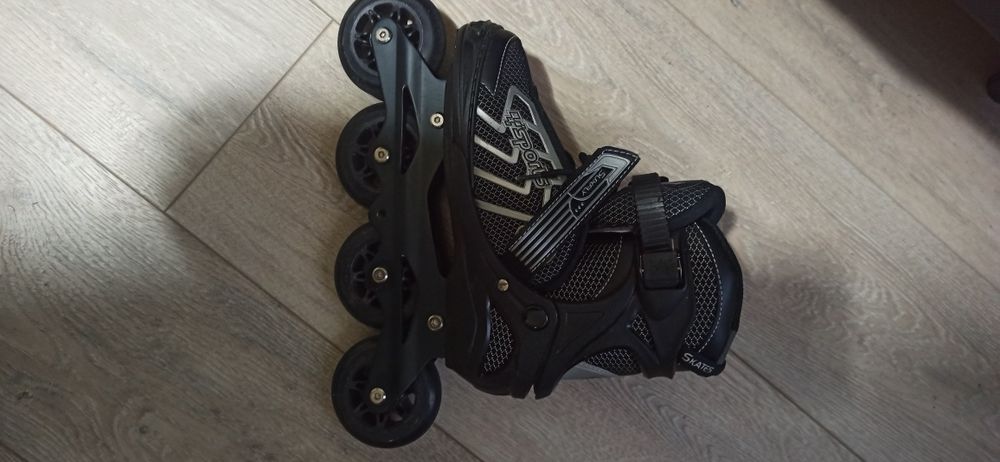 Роликовые коньки