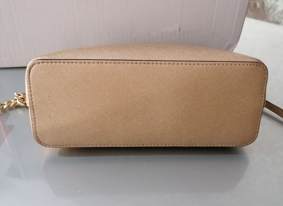 Mala Michael Kors dourada