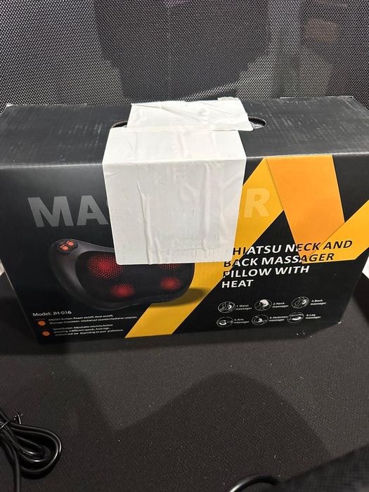 Masażer poduszka masującą