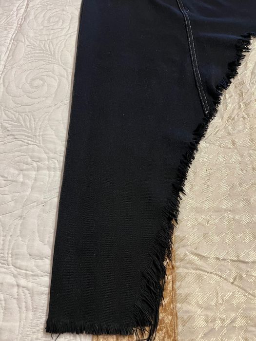 Mini saia de ganga sarjada, efeito calça de um lado