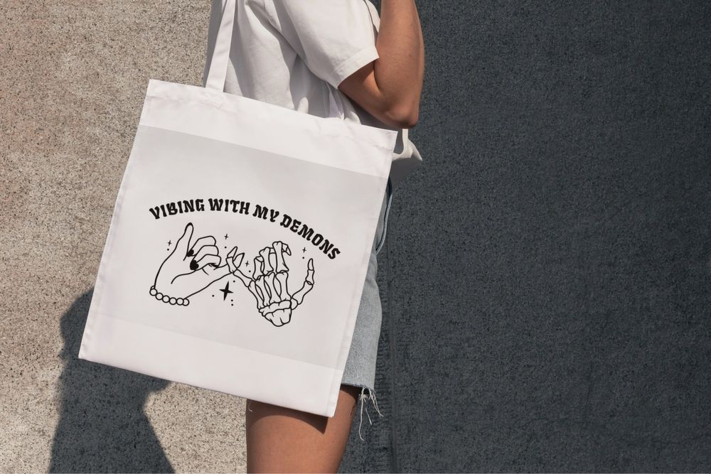 Tote bag vibing demons