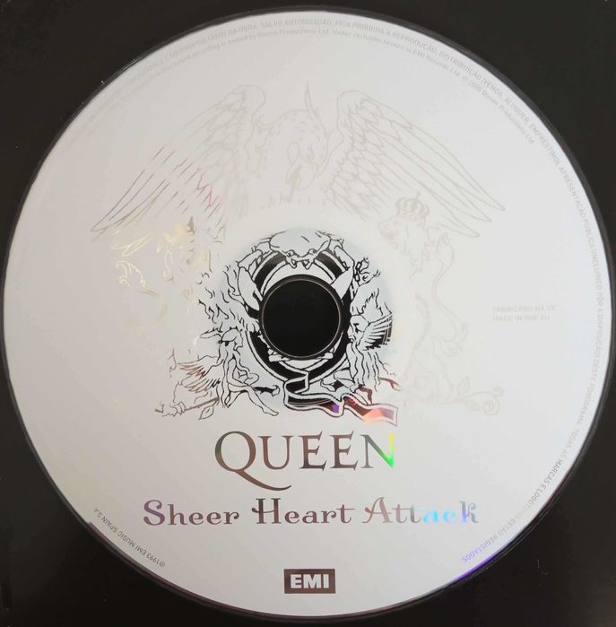 4 Livros com as letras das músicas  dos QUEEN mais os 4 DVD's