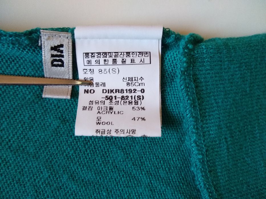 Super delikatna damska asymetryczna luźna sweterek/bluzka, 47% Merino