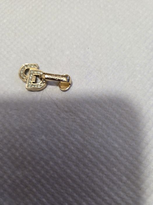 Brinco Christian Dior