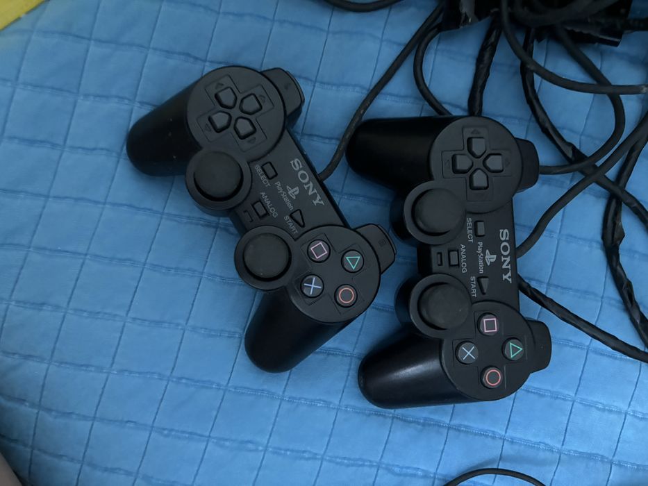 PS2 com controles