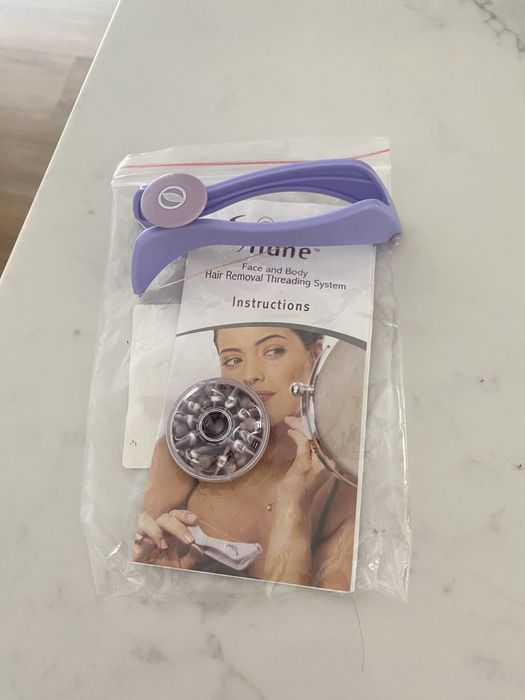 Removedor de pêlos a linha