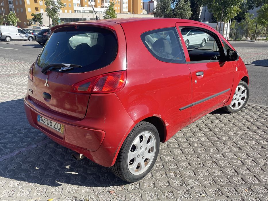 Mitsubishi colt 1.1 CZ3 c/ ar condicionado  2005