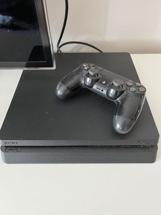 Playstation 4 Slim - 256gb ssd + Jogo