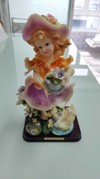 Boneca em marfinite nova, com caixa