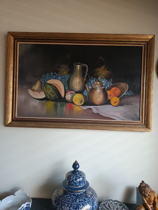 Quadros muito bonitos em estado quase novo.Um floral outro  alusivo a frutas!