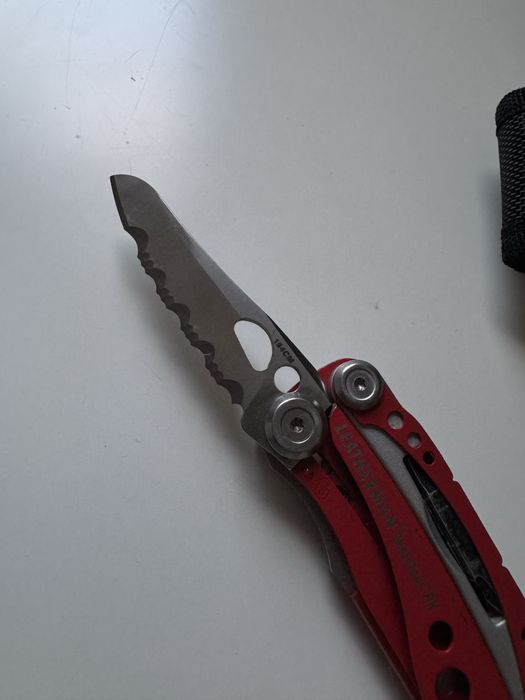 Leatherman Skeletool RX + bit do bicia szyb + kabura