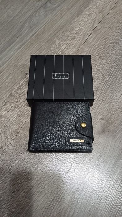 Чоловічий гаманець шкіряний( портмоне, кошелек) PIROYECE на засцібці.