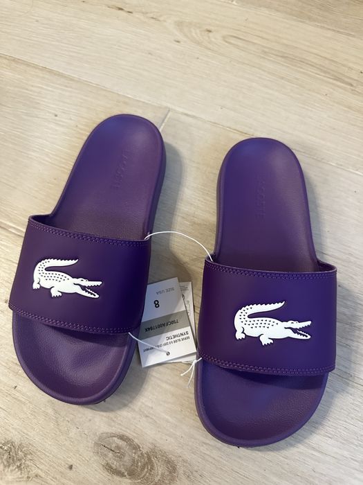 Шльопкі Lacoste нові