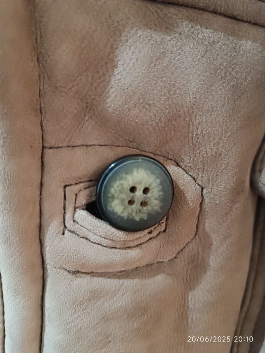 Casaco em pele de carneiro