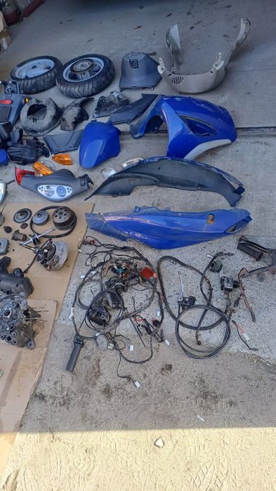 Piaggio FLY 50 części kufer,wydech,lampa,pokrywa,stelaż,wał,błotnik,