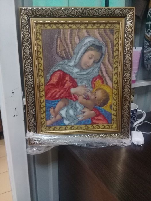 Вишита ікона бісером Годувальницч