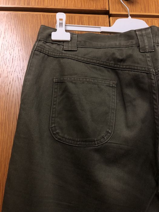 Calças verde escuro