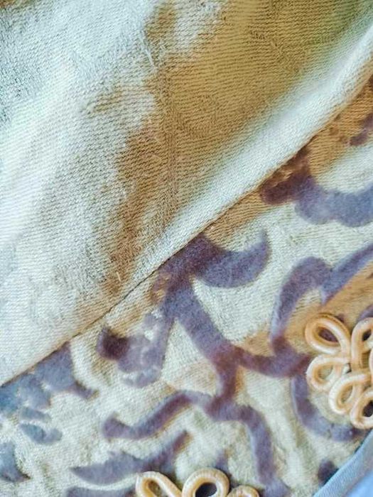 Spódnica i kaftan zielone z ornamentami