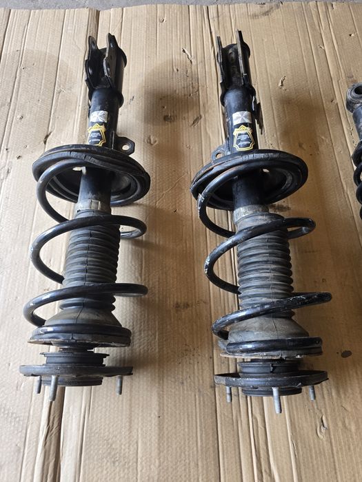 Стойки в сборе Toyota Corolla E12 Verso передние задние Тойота Королла