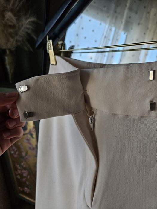 Eleganckie kremowe spodnie damskie H&M proste nogawki wysoki stan XS ś