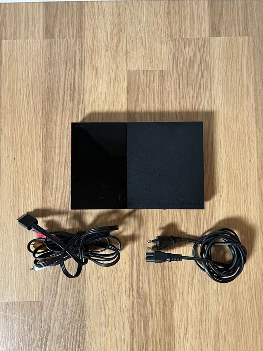 Mega Pack PS2 (Consola+ 3 Comandos+ 15 Jogos+ 2 Microfones+ 32MB Card)