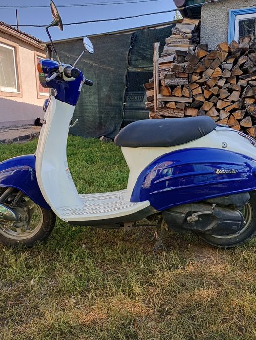 Скутер  Сузукі верде