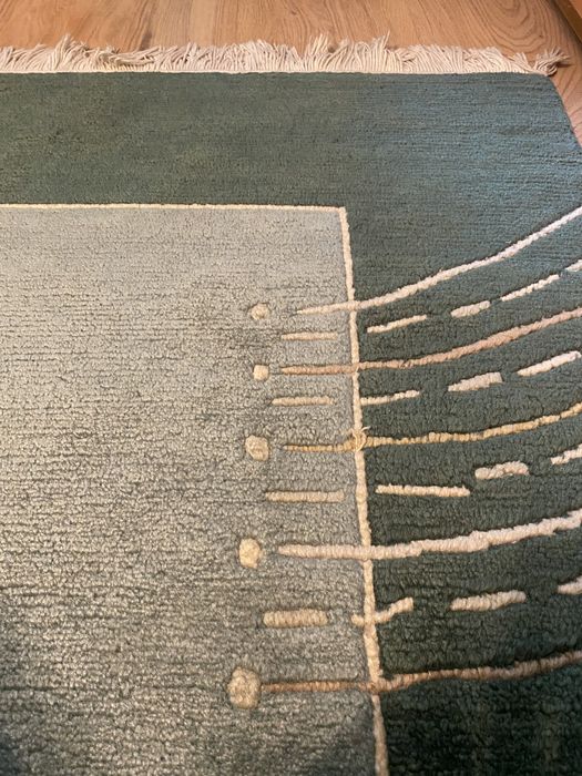 Dywan wełniany z drobną wadą