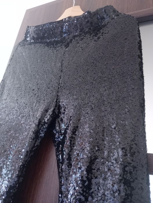 Spodnie dzwony cekiny