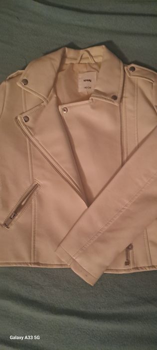 Kurtka firmy sin say