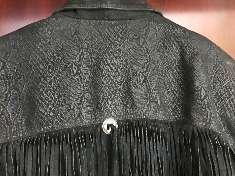 Casaco em pele verdadeira