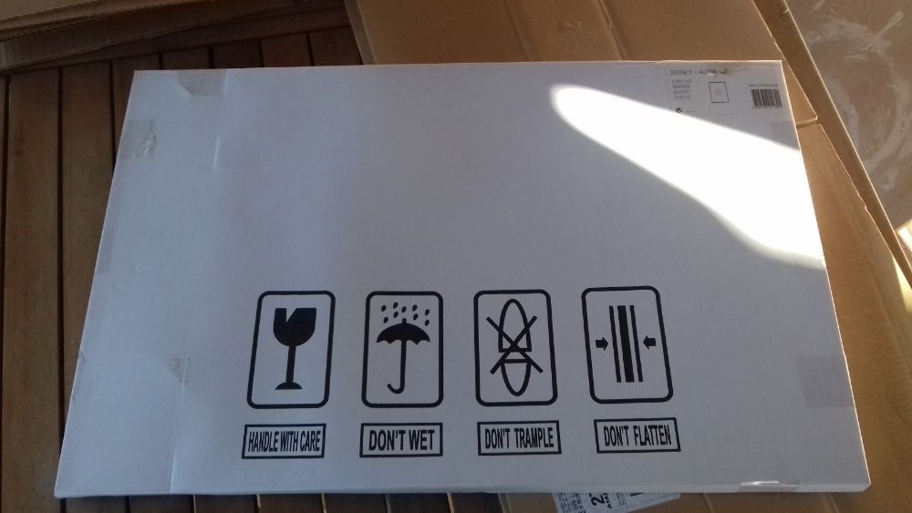Espelho 42x66cm Novo - tem suporte para pendurar