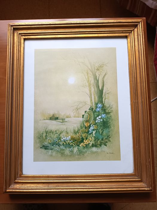 Quadro com moldura dourada