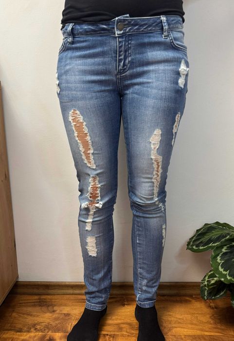 Spodnie jeansowe z dziurami rozdarciami jeansy Sparkz W28 L32 S