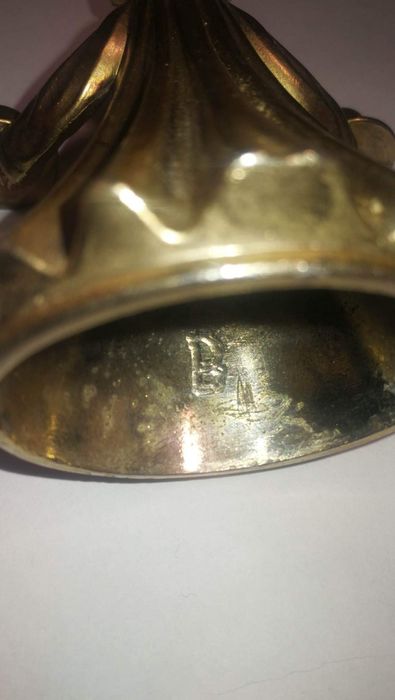 Anioł świecznik z brązu