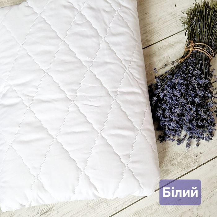 Водонепроникний стьобаний наматрасник-простирадло.