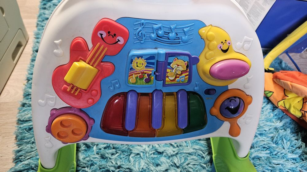 Muzyczny chodzik pchacz Fisher Price