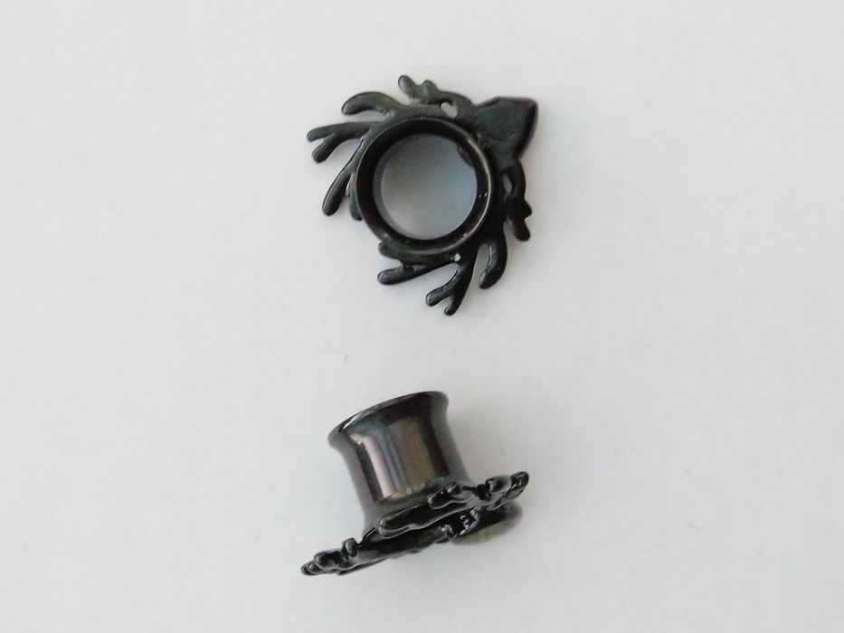 Dwa nowe stalowe czarne tunele piercing jeleń 10 mm masa perłowa Łódź