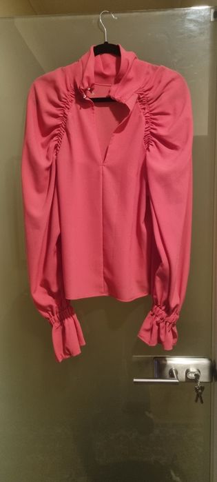 Blusa rosa que veste até L