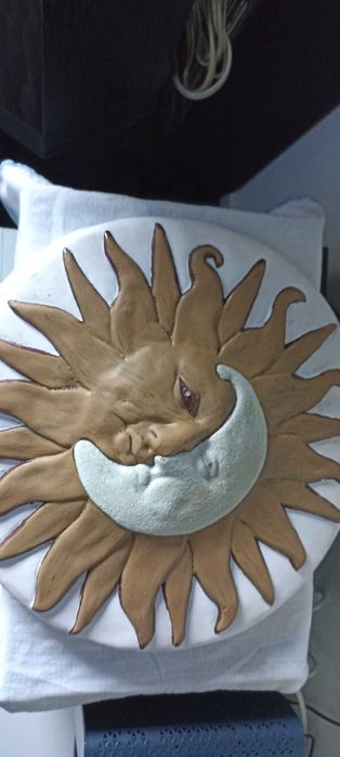 Escultura sol em gesso
