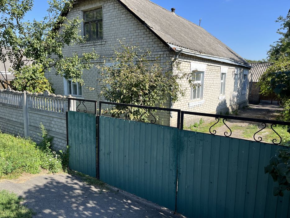 Будинок (частина) з участком та городом