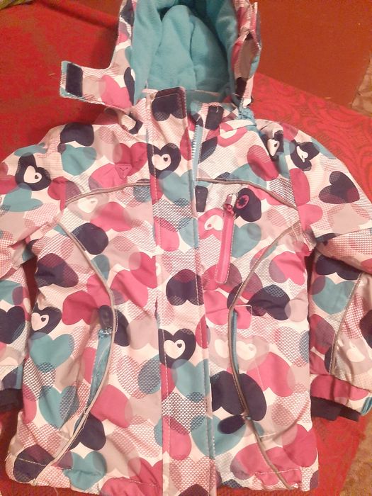 Дитячі, зимові комбінезони.