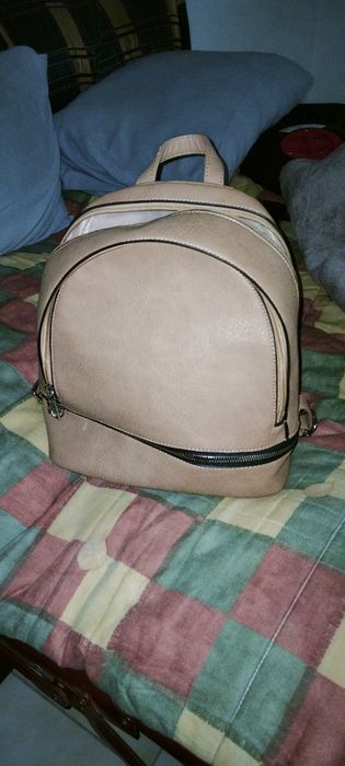 Para desocupar, dominó, puzzle de Portugal e uma mochila