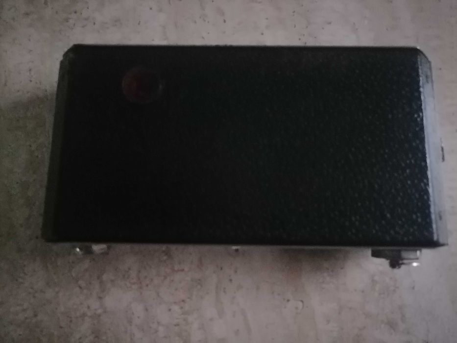 Máquina Kodak centenária de fole.