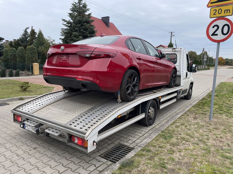 Transport Pojazdów Maszyn Holowanie Pomoc Drogowa Polska Europa