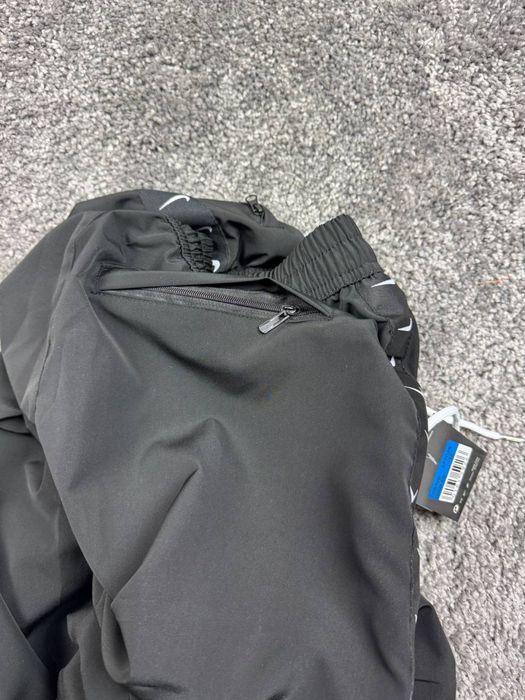 Штани Nike з лампасами