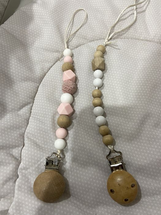 Тримачі для пустушки , дурника